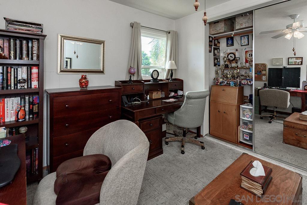 2414 Monroe Avenue San Diego, CA 92116 - Photo 55 of 65 a view of a workspace with furniture and a window