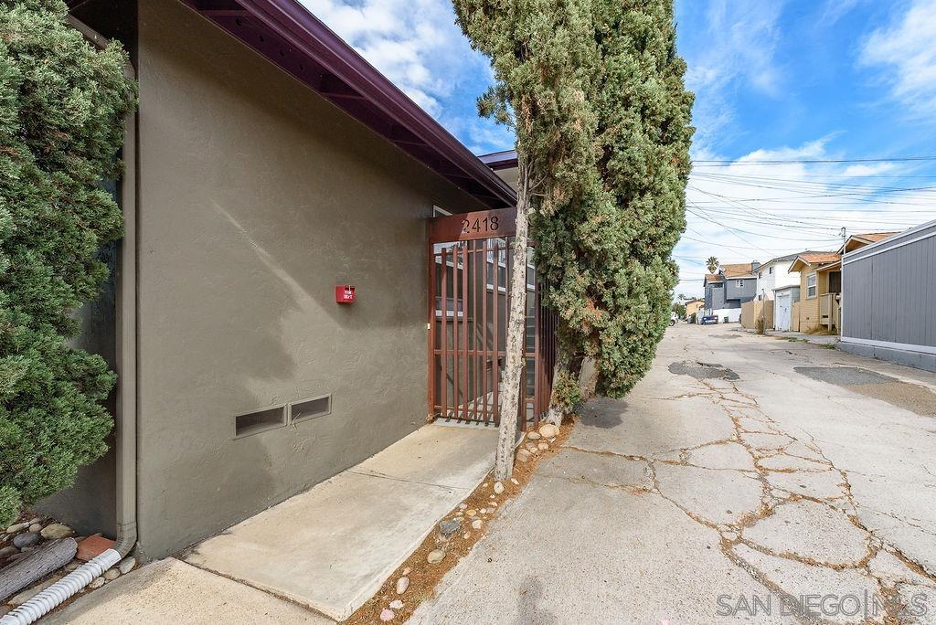 2414 Monroe Avenue San Diego, CA 92116 - Photo 60 of 65 a view of a house with a backyard