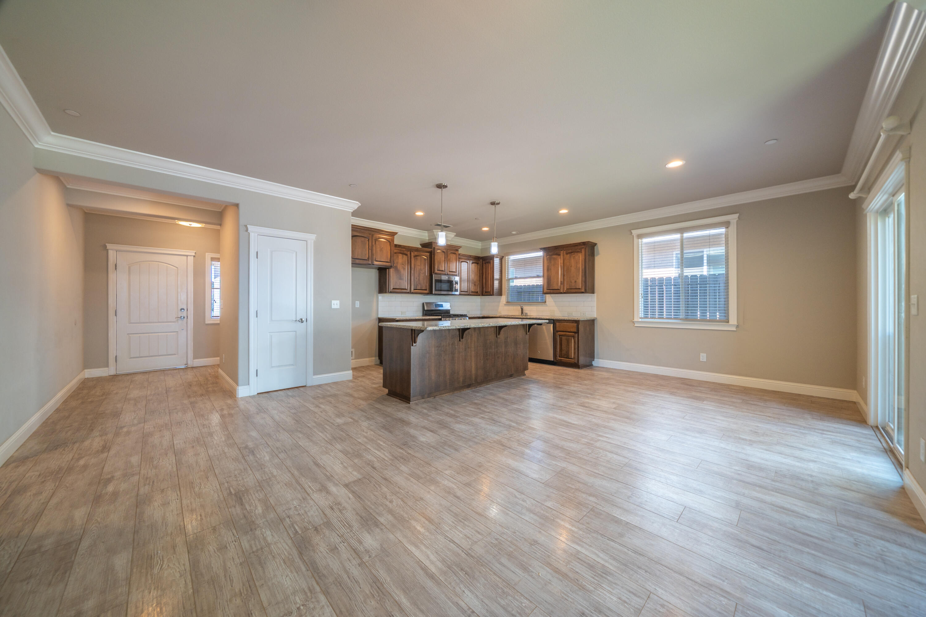 5571 Muir Peak Road Redding, CA 96002 - Photo 13 of 42 a view of a kitchen with a sink and a window