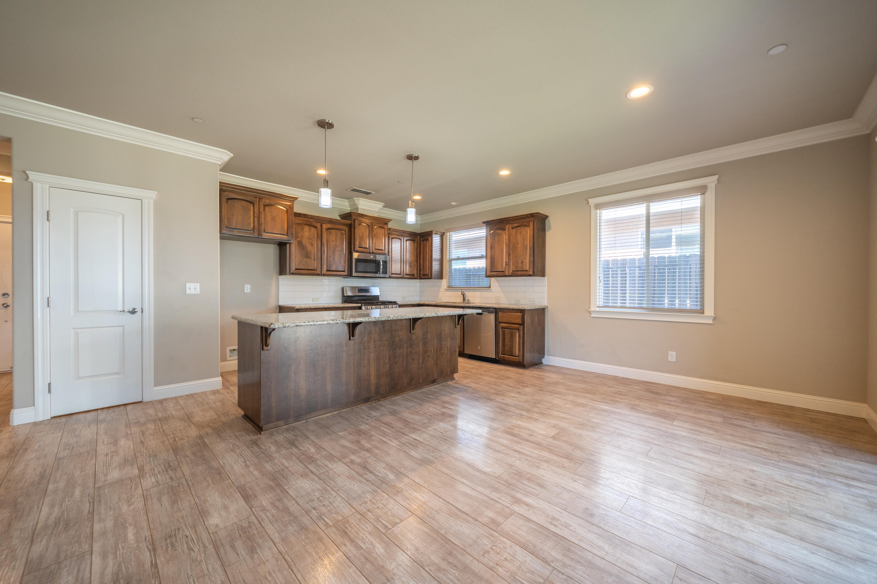 5571 Muir Peak Road Redding, CA 96002 - Photo 15 of 42 a view of kitchen with wooden floor