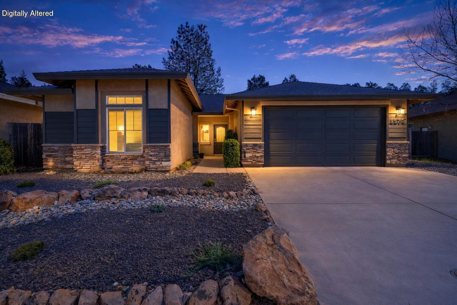 5571 Muir Peak Road Redding, CA 96002 - Photo 2 of 42 a front view of a house with a yard