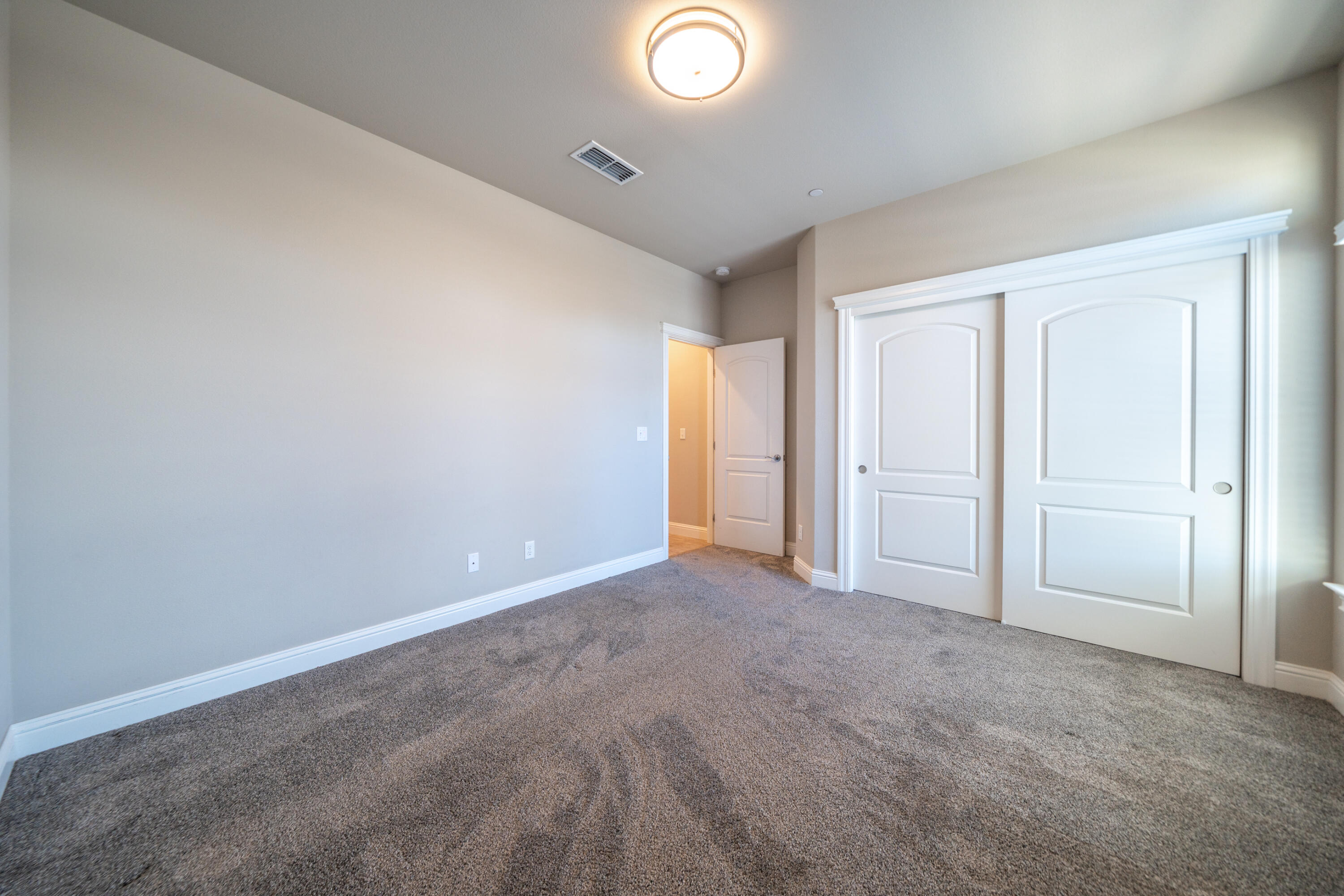 5571 Muir Peak Road Redding, CA 96002 - Photo 30 of 42 an empty room with closet area