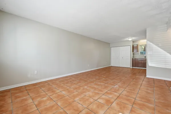 a view of empty room with a natural light