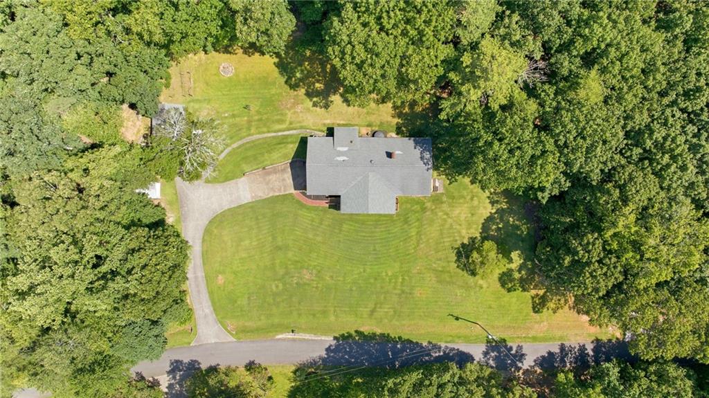 6470 Samoa Way Flowery Branch, GA 30542 - Photo 10 of 61 an aerial view of a residential houses with yard