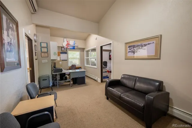 a kitchen with a stove and a refrigerator