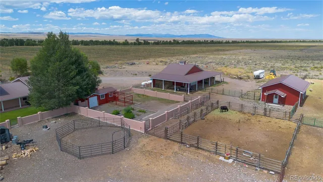 an aerial view of a house with lake view