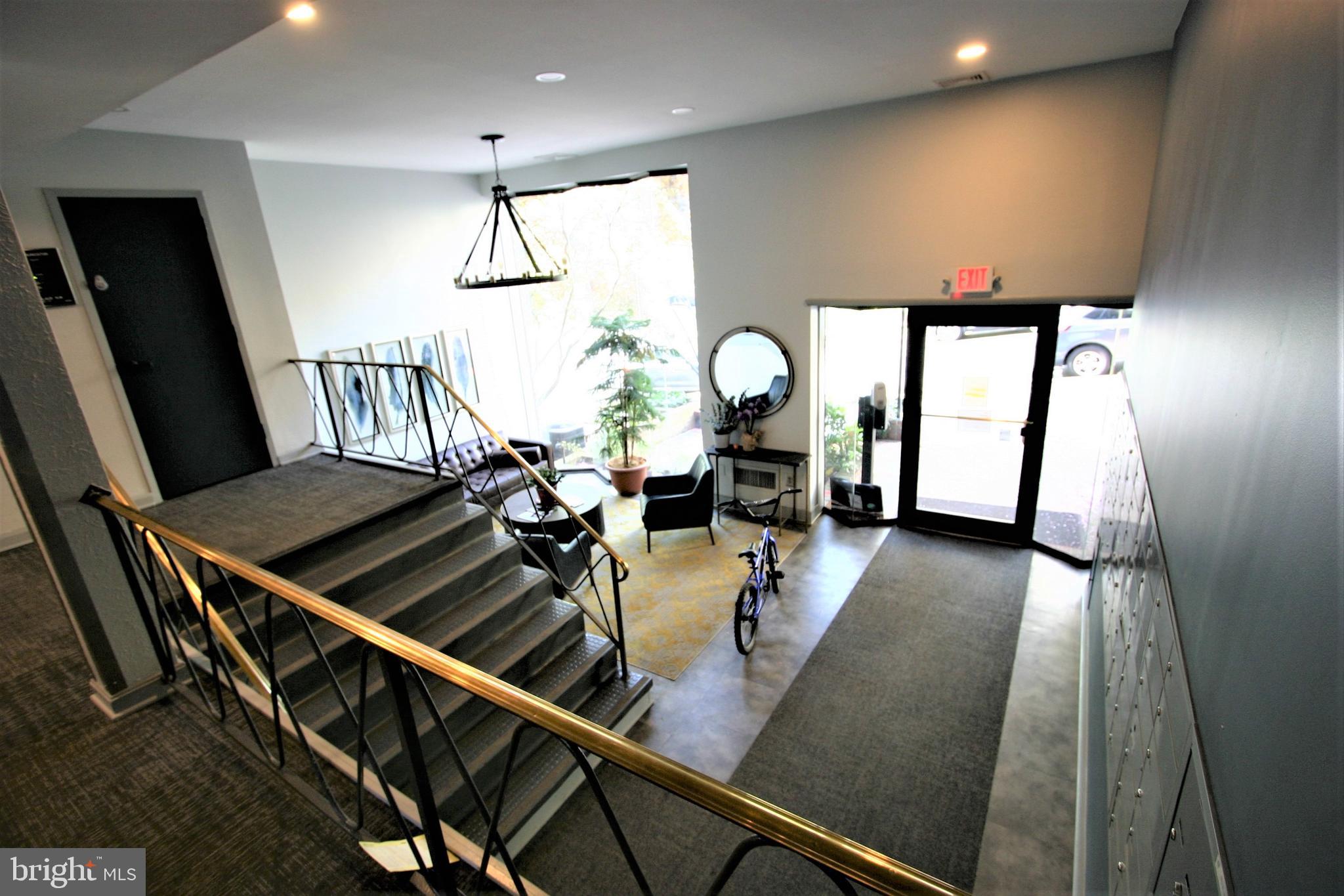 4114 Davis Place Northwest, Unit 210 Washington, DC 20007 - Photo 3 of 22 Lobby and Front Entrance