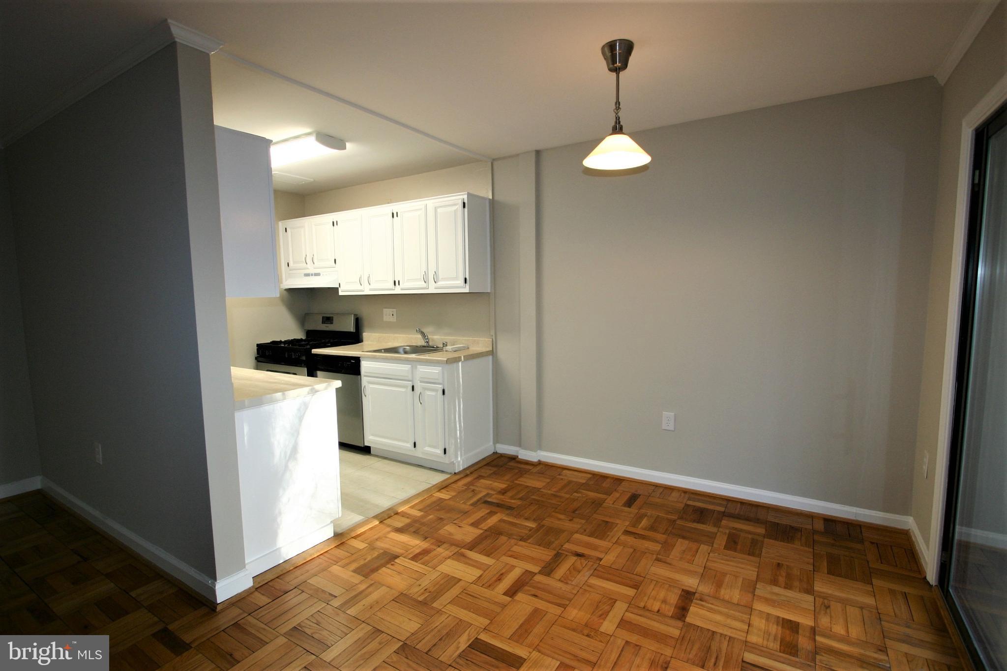 4114 Davis Place Northwest, Unit 210 Washington, DC 20007 - Photo 7 of 22 Dining Room and Kitchen