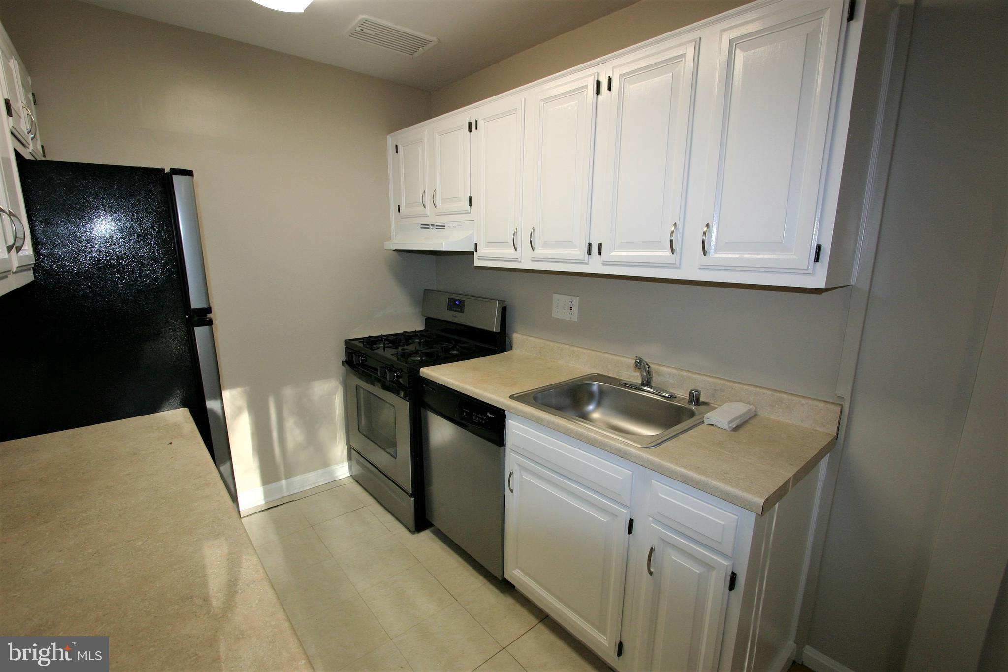 4114 Davis Place Northwest, Unit 210 Washington, DC 20007 - Photo 9 of 22 Kitchen Cabinets 1