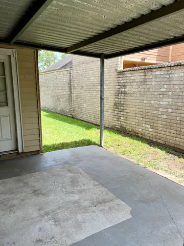 a view of a garden with an umbrella