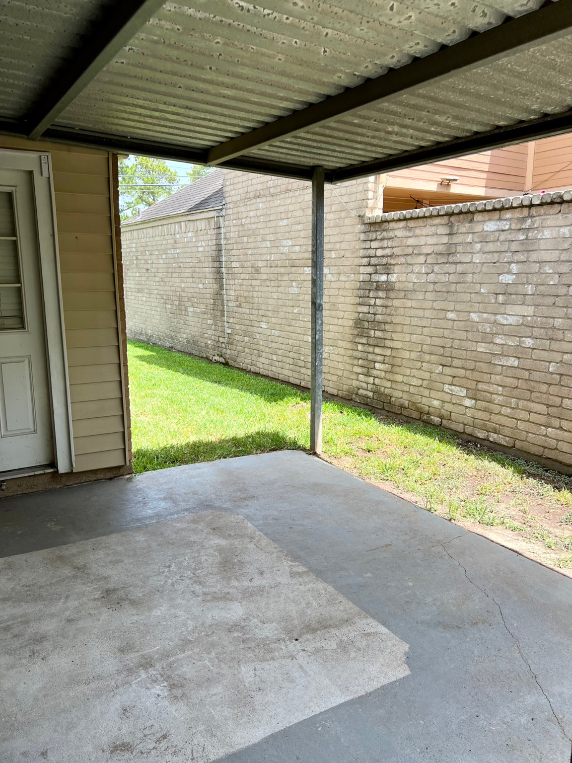 3702 Echo Grove Lane Houston, TX 77043 - Photo 16 of 18 a view of a garden with an umbrella