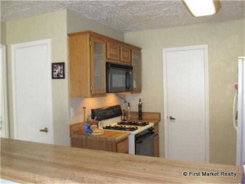 3702 Echo Grove Lane Houston, TX 77043 - Photo 3 of 18 a room with a bed and a mirror