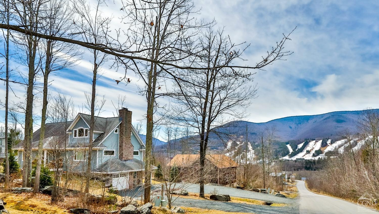 a view of a large building with a yard