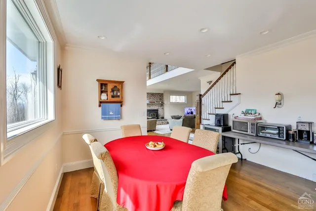 a view of a livingroom with furniture and wooden floor
