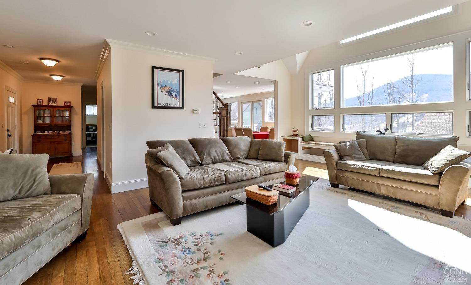 88 Gaby Road Hunter, NY 12442 - Photo 21 of 60 a living room with furniture or couch and a large window
