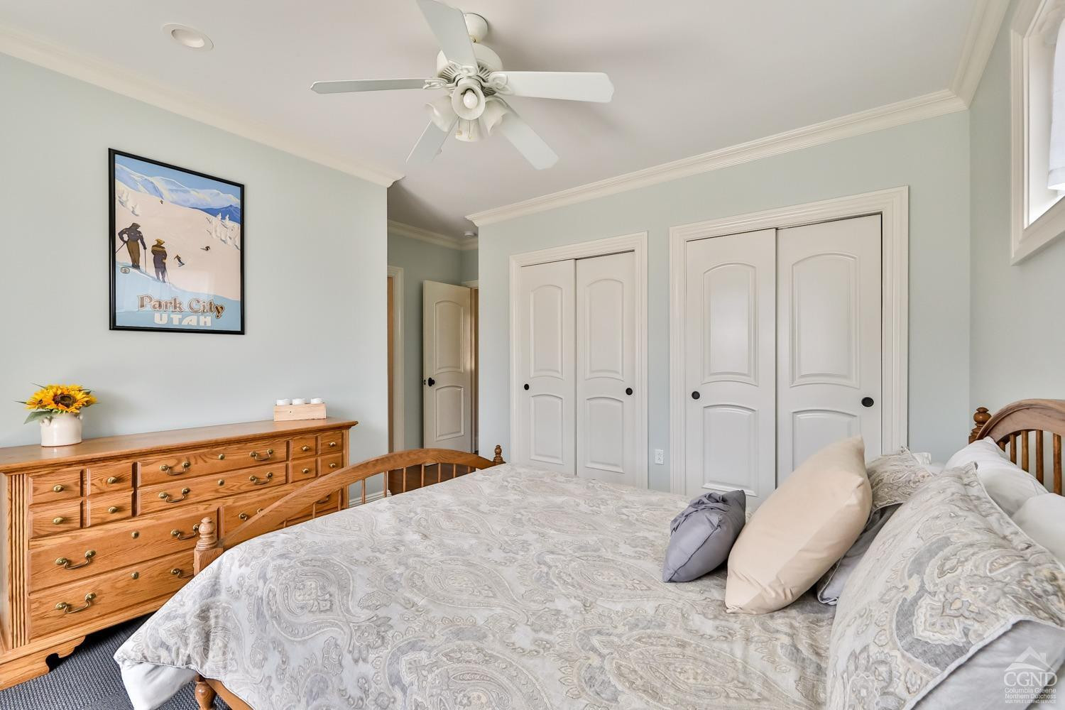 88 Gaby Road Hunter, NY 12442 - Photo 30 of 60 a bedroom with a bed and a chandelier