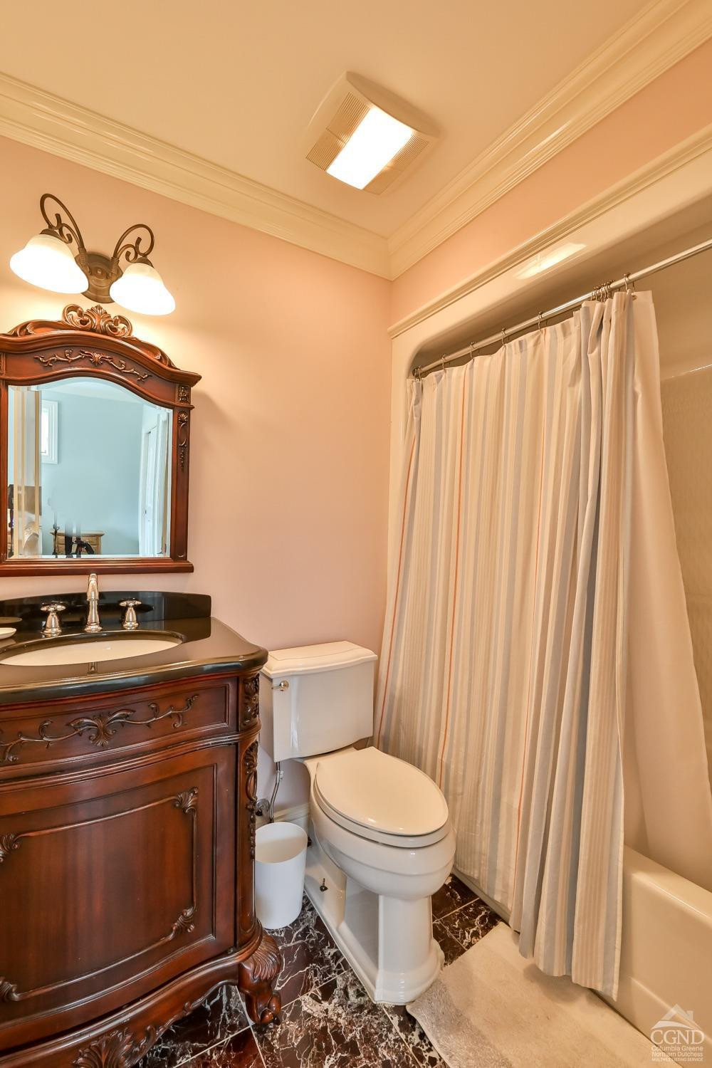 88 Gaby Road Hunter, NY 12442 - Photo 32 of 60 a living room with a toilet and a sink