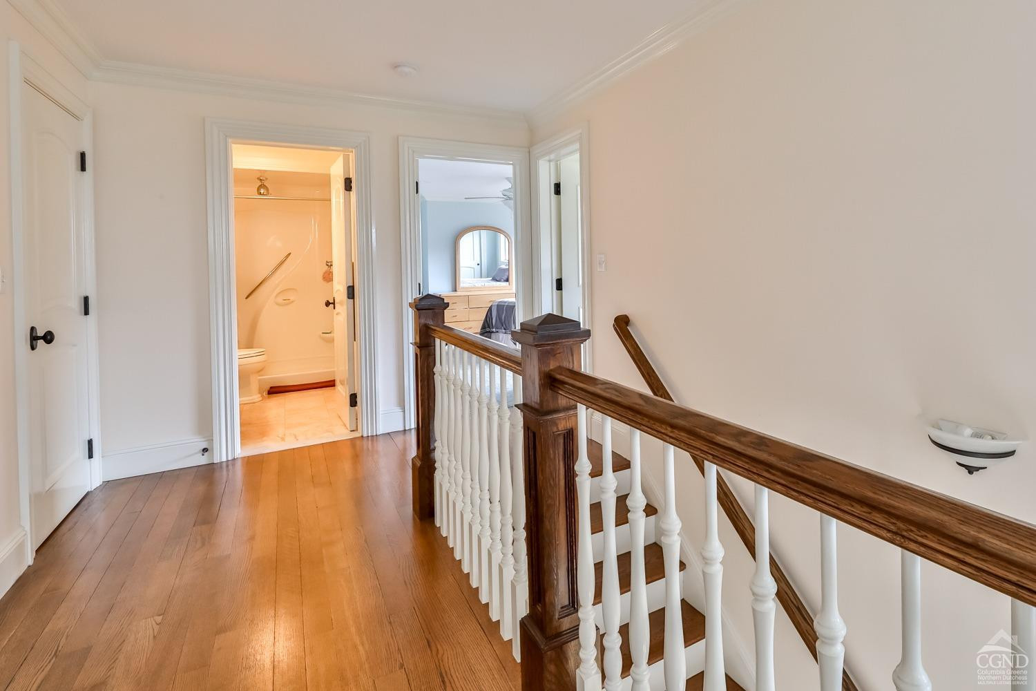 88 Gaby Road Hunter, NY 12442 - Photo 33 of 60 a view of a hallway with wooden floor and stairs