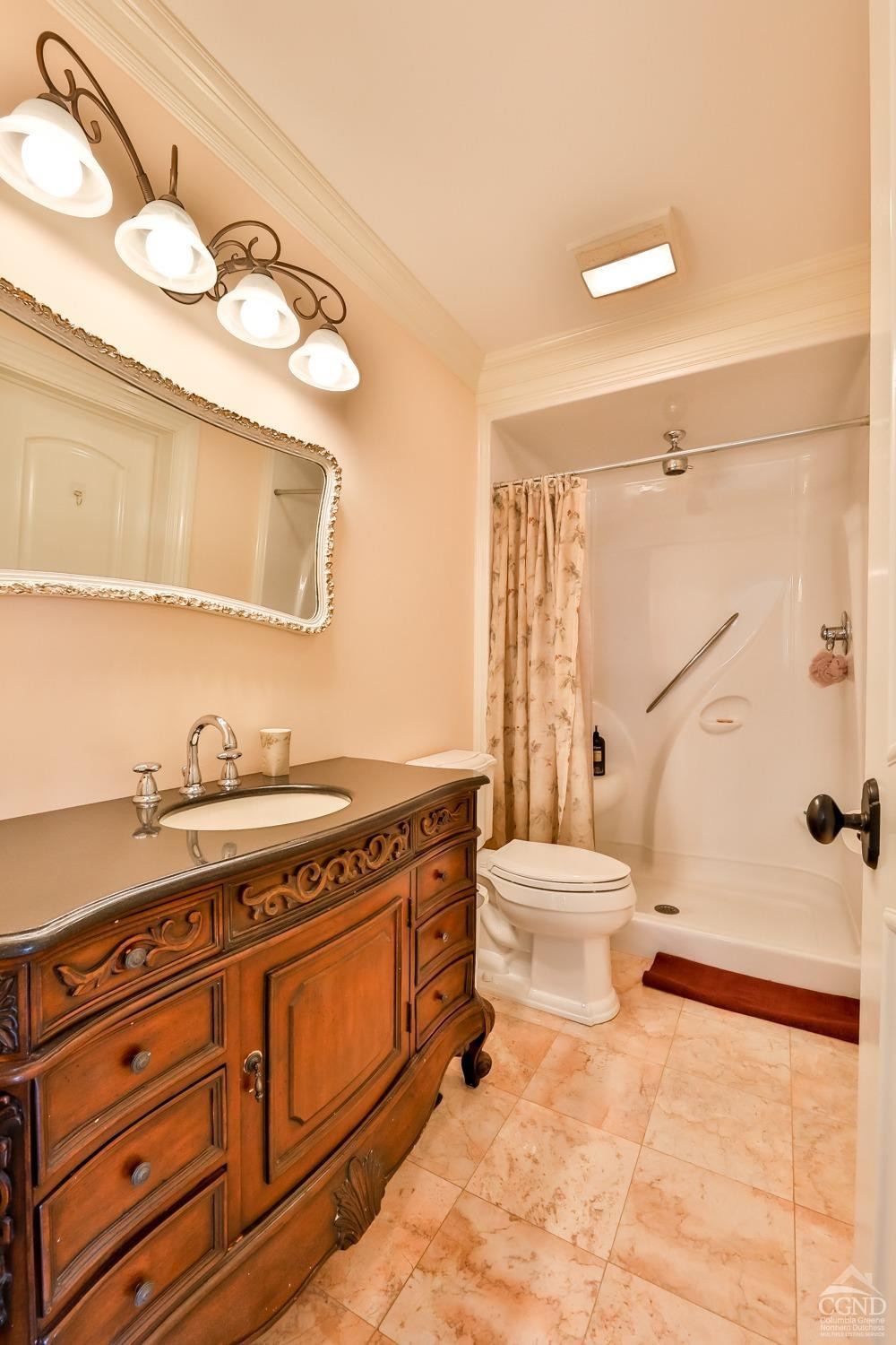88 Gaby Road Hunter, NY 12442 - Photo 40 of 60 a bathroom with a sink a toilet and shower