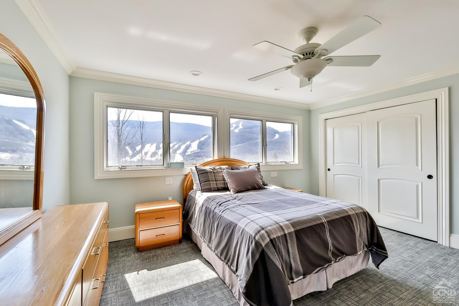 88 Gaby Road Hunter, NY 12442 - Photo 42 of 60 a bedroom with a bed and wooden floor