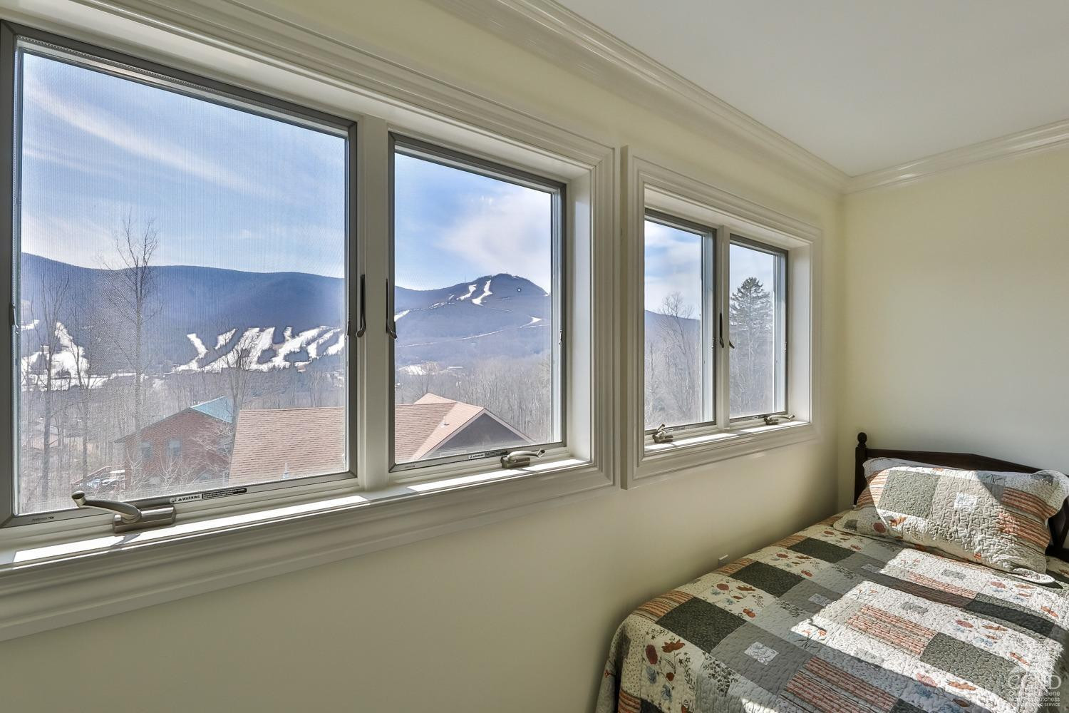 88 Gaby Road Hunter, NY 12442 - Photo 46 of 60 a bedroom with a bed and a window