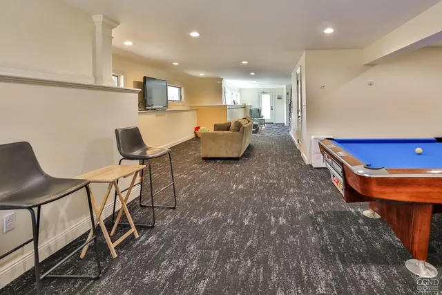 a aerial view of a house with a yard