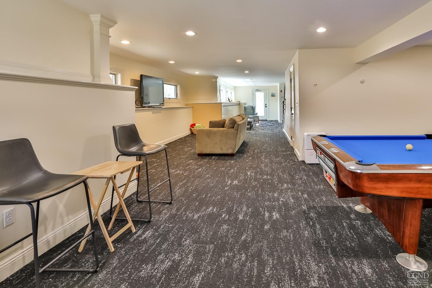 88 Gaby Road Hunter, NY 12442 - Photo 50 of 60 a living room with furniture and a dining table with wooden floor