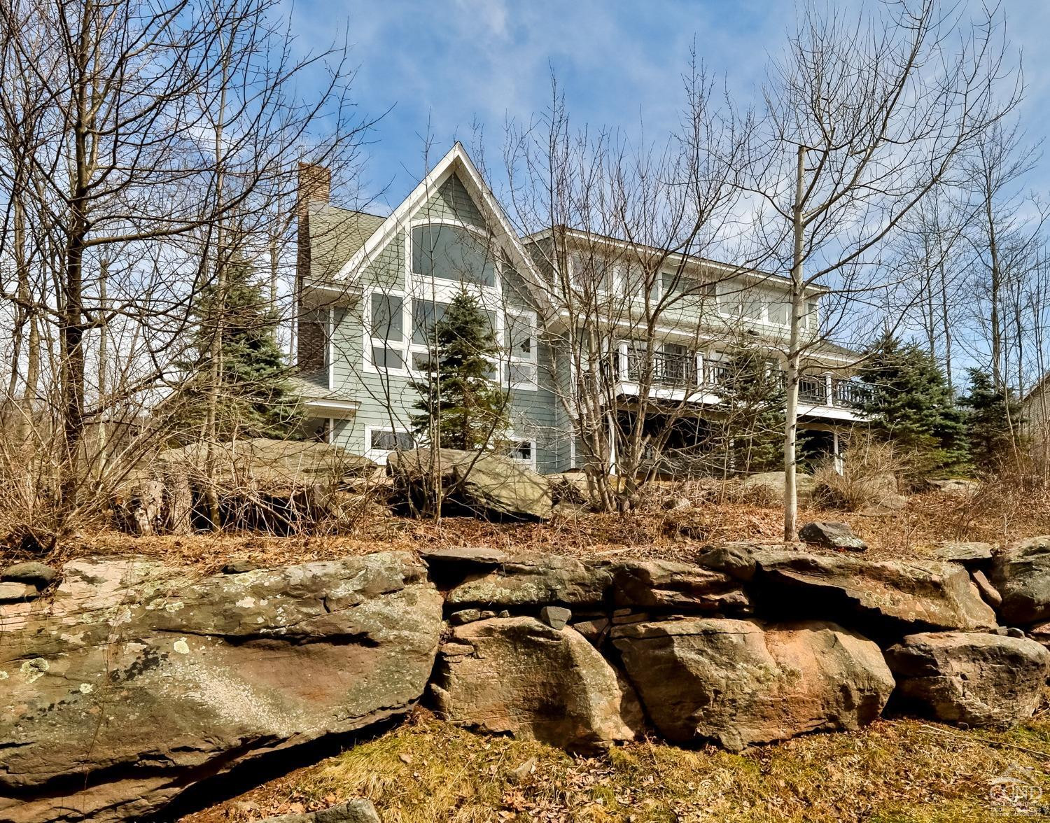 88 Gaby Road Hunter, NY 12442 - Photo 5 of 60 a view of a house with a yard