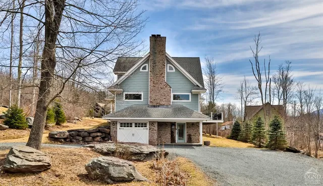a view of a house with patio