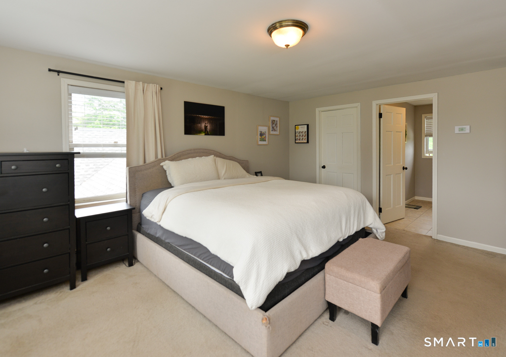 109 Harrison Lane Bethlehem, CT 06751 - Photo 18 of 28 a bedroom with a bed and window