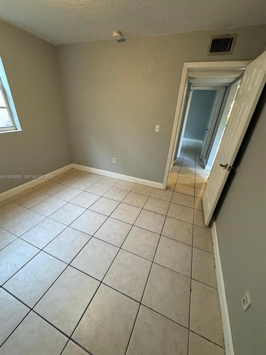 652 Northwest 3rd Street, Unit 104 Miami, FL 33128 - Photo 6 of 15 a view of a utility room