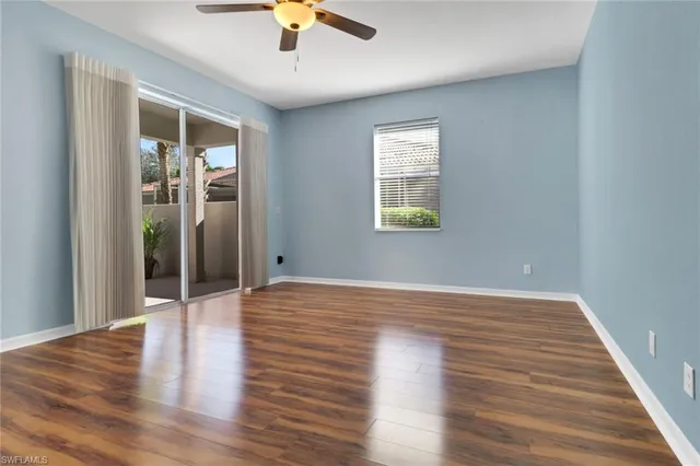 a bathroom with a bathtub a sink a toilet and a mirror