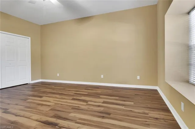 a view of a park with swings and slides