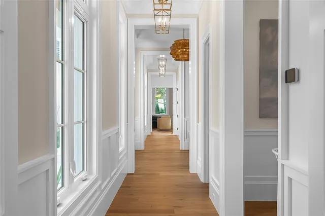 a kitchen with a table chairs and a stove