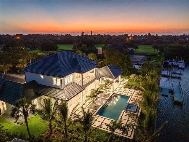 an aerial view of a house with a garden