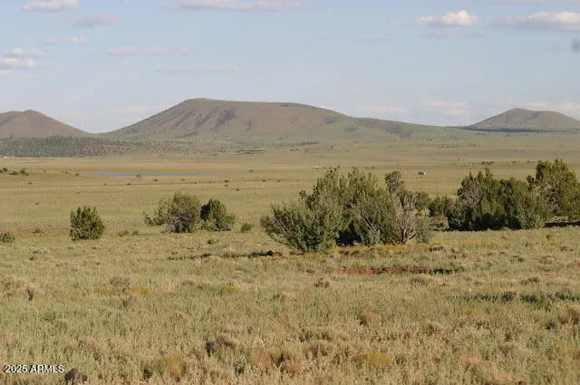a view of lake with mountain