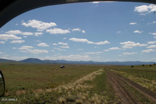 a view of lake and mountain