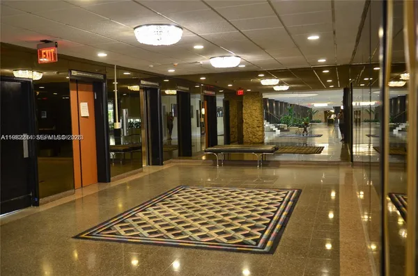 a view of a lobby with a couch