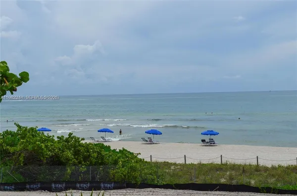 a view of beach and ocean