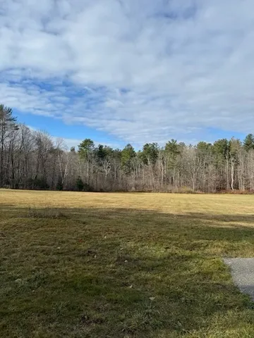 a view of an ocean and a mountain