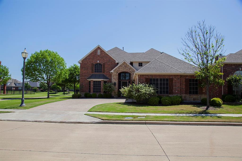 4122 West Crescent Way Frisco, TX 75034 - Photo 1 of 20 a front view of house with yard and green space