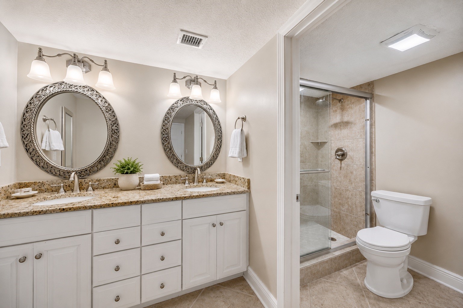 2117 Beachwood Road, Unit 2117 Fernandina Beach, FL 32034 - Photo 11 of 36 a bathroom with a toilet a sink and mirror