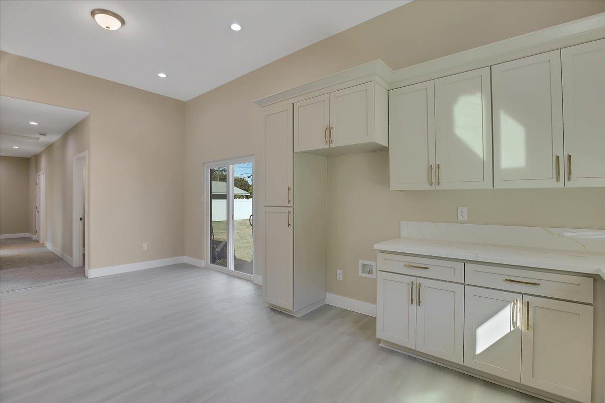 130 Fremont Street Colusa, CA 95932 - Photo 15 of 39 a view of a kitchen with white cabinets