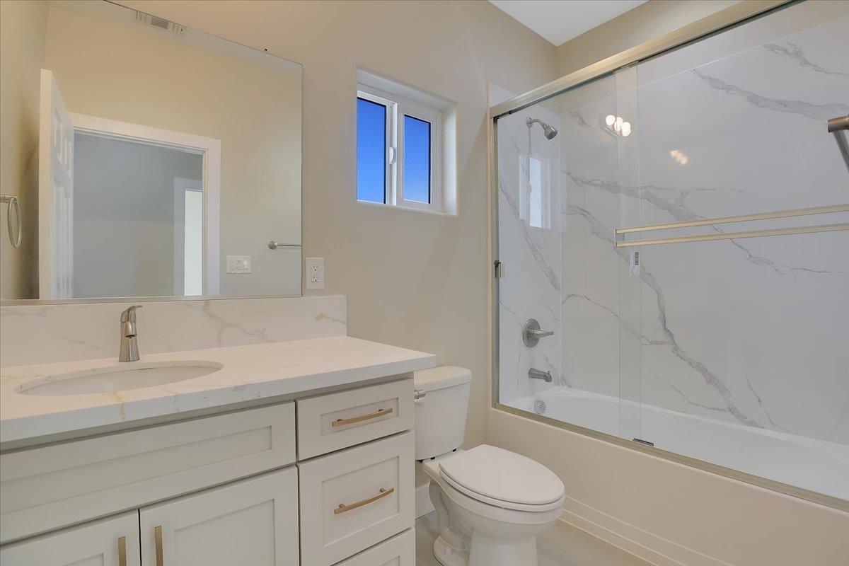 130 Fremont Street Colusa, CA 95932 - Photo 20 of 39 a bathroom with a sink a toilet and shower
