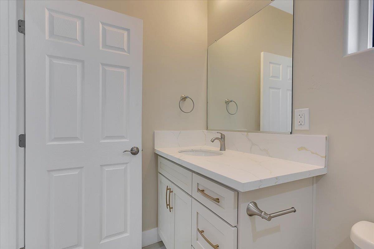 130 Fremont Street Colusa, CA 95932 - Photo 21 of 39 a bathroom with a sink and a mirror