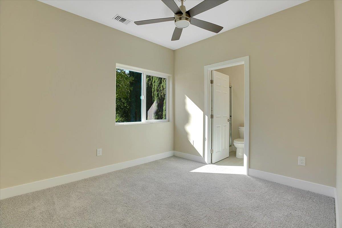 130 Fremont Street Colusa, CA 95932 - Photo 24 of 39 an empty room with windows and fan