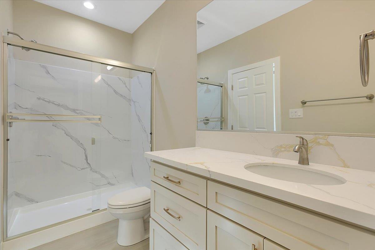 130 Fremont Street Colusa, CA 95932 - Photo 27 of 39 a bathroom with a sink a toilet and shower