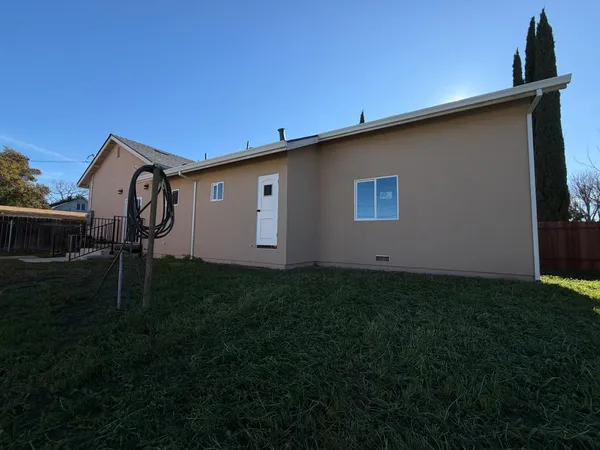 a view of a backyard with a garden