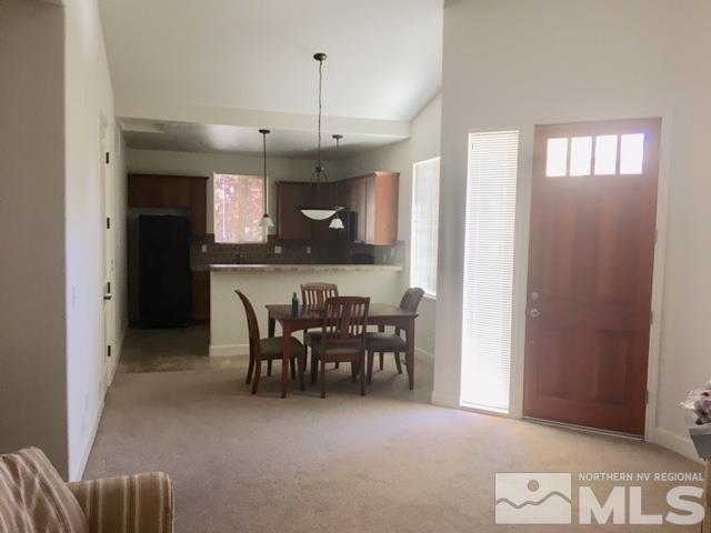 3677 A Warren Way Reno, NV 89509 - Photo 5 of 10 a view of a dining room with furniture