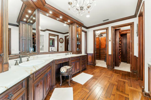 a dining room with furniture window and wooden floor